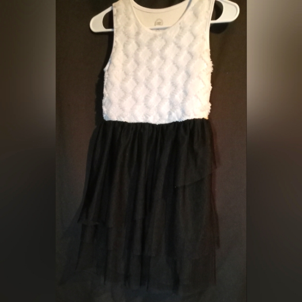 Size 10-12 black and white